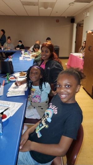 Craft Group of families, participating in a fun group activity at Hillside Public Library